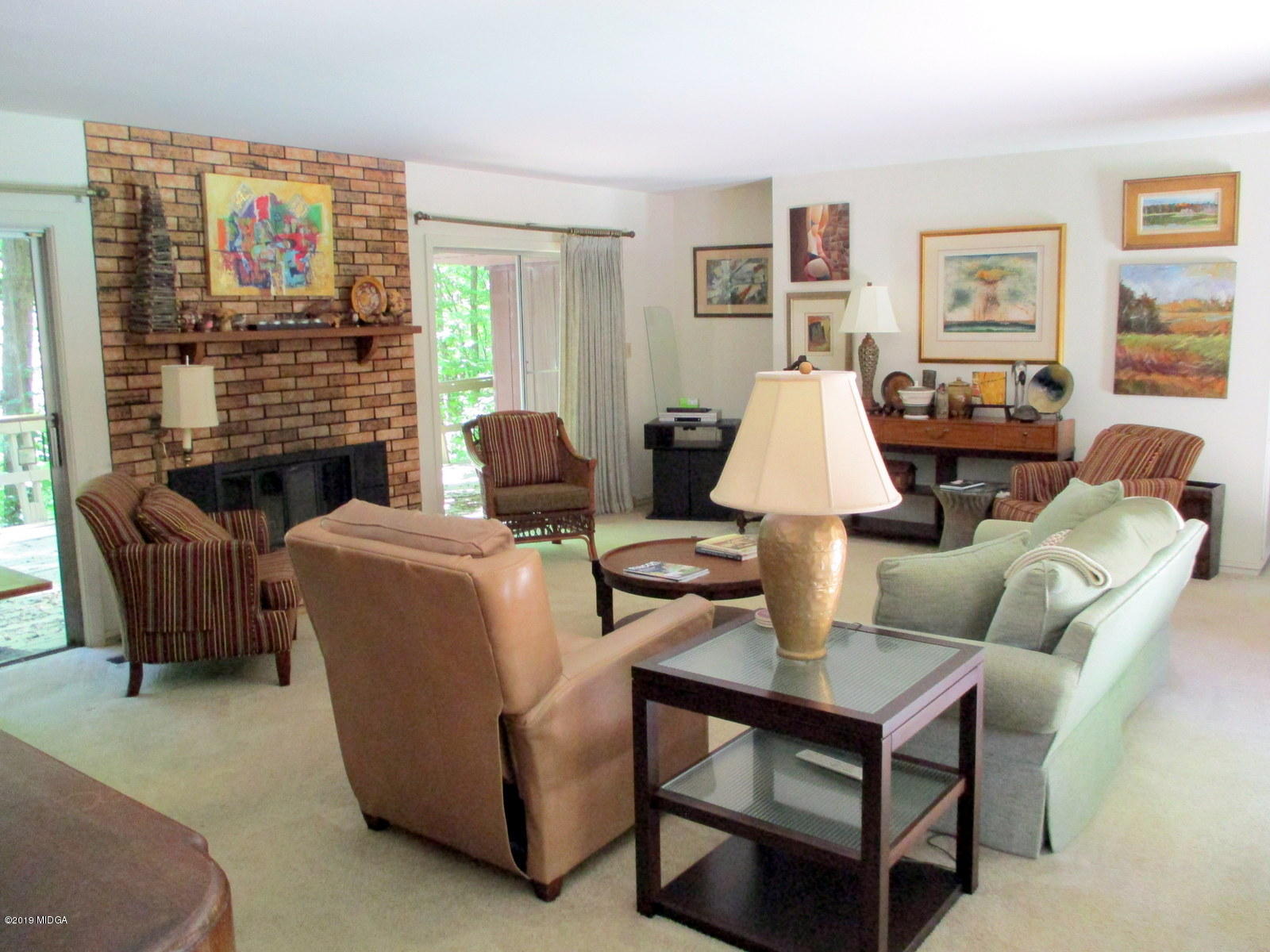 1884 Long Ridge Place Macon, GA 31211 - Photo 11 of 32 a living room with fireplace furniture and a large window