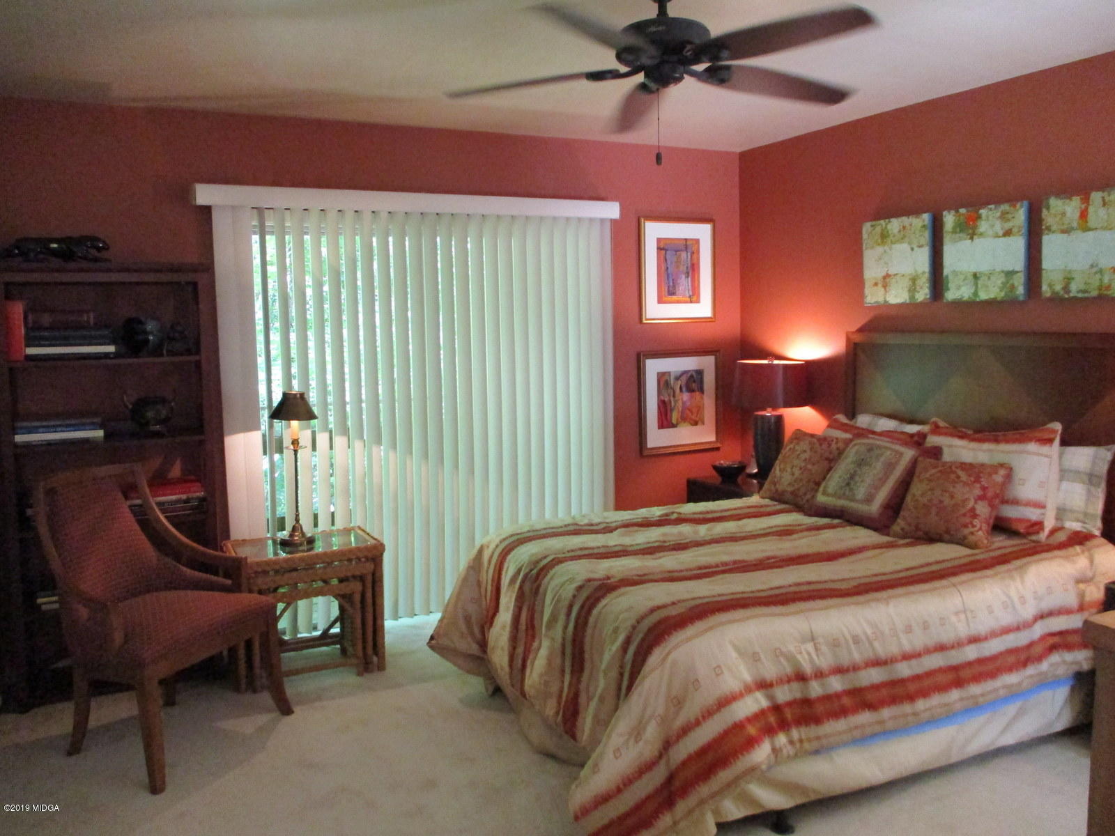 1884 Long Ridge Place Macon, GA 31211 - Photo 13 of 32 a bedroom with a bed chair and glass window