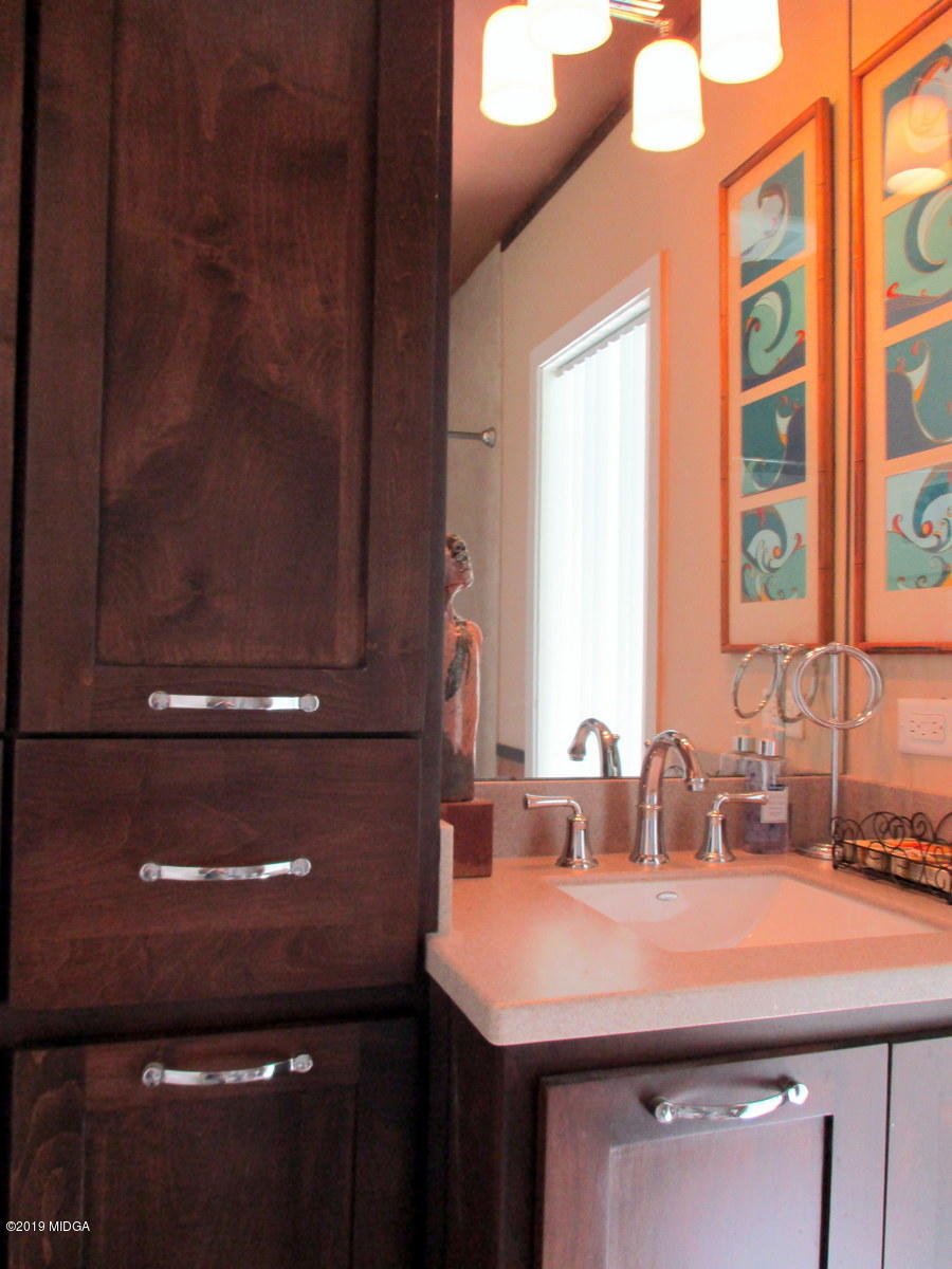 1884 Long Ridge Place Macon, GA 31211 - Photo 14 of 32 a room with a sink and a mirror