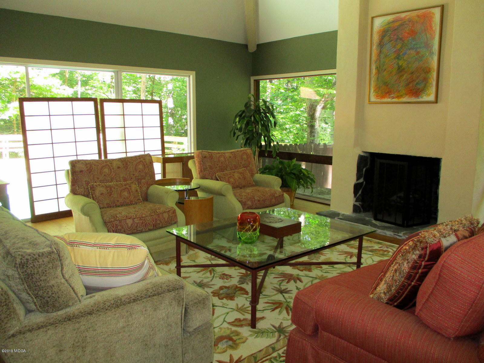 1884 Long Ridge Place Macon, GA 31211 - Photo 23 of 32 a living room with furniture and a fireplace