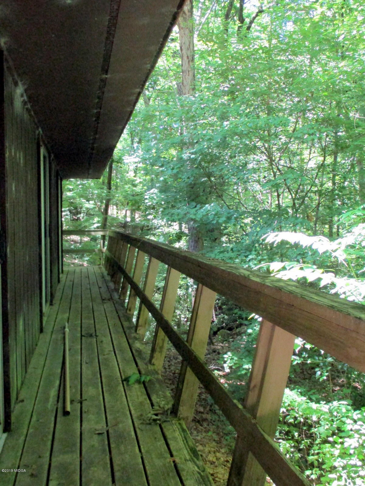 1884 Long Ridge Place Macon, GA 31211 - Photo 25 of 32 a view of balcony with wooden floor