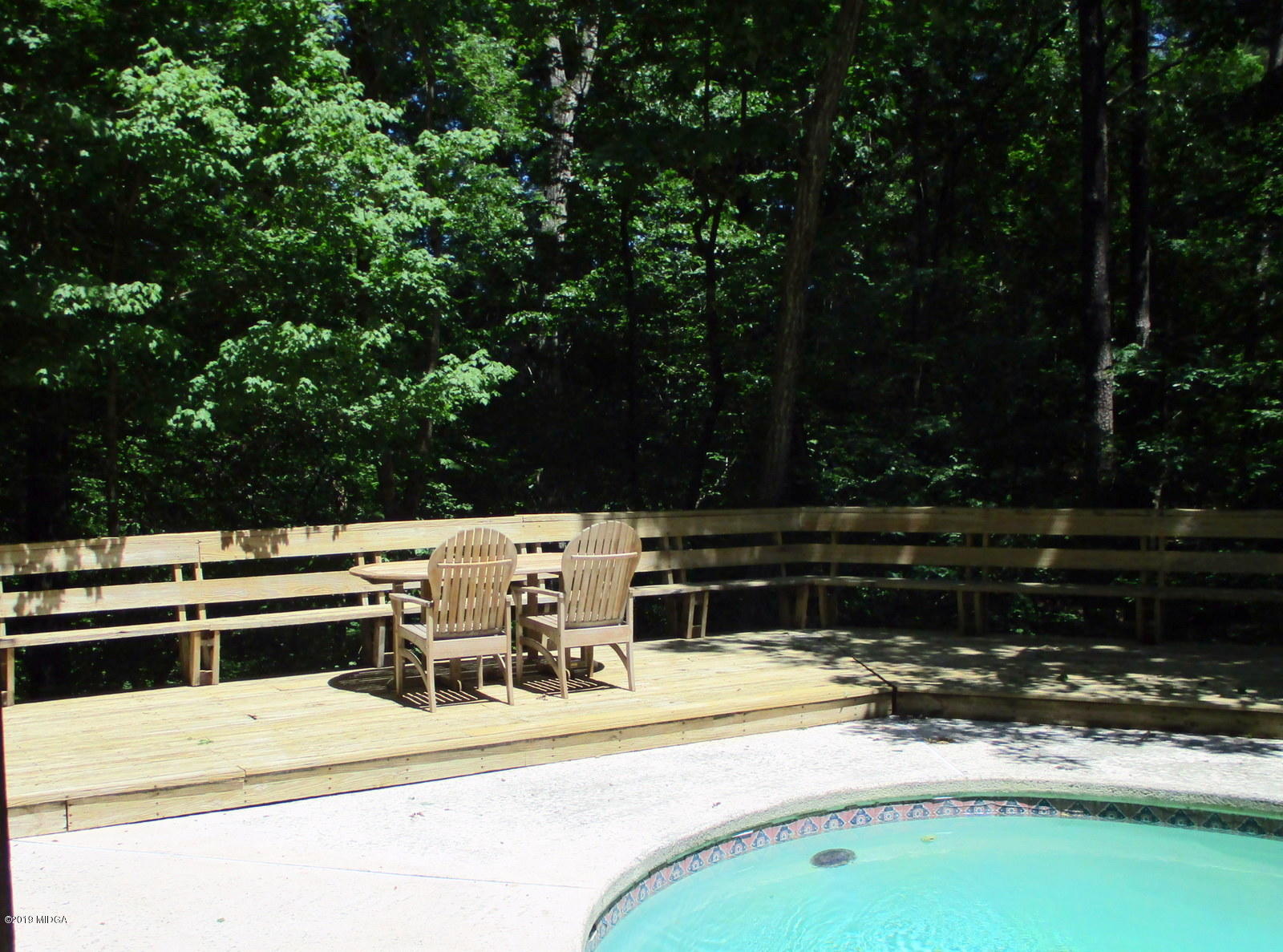 1884 Long Ridge Place Macon, GA 31211 - Photo 26 of 32 a view of a patio with swimming pool