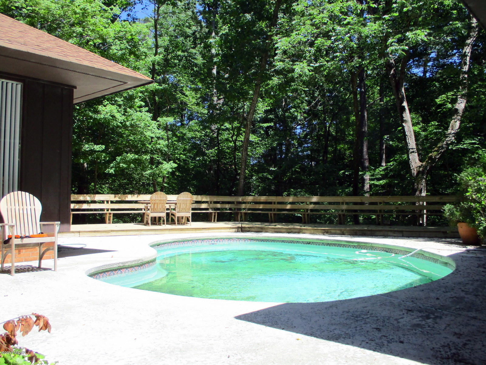 1884 Long Ridge Place Macon, GA 31211 - Photo 9 of 32 a view of a swimming pool with a patio