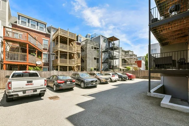 a car parked in front of a building