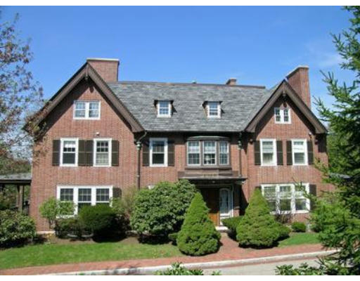 46 Welch Road Brookline, MA 02445 - Photo 1 of 15 a front view of a house with a yard