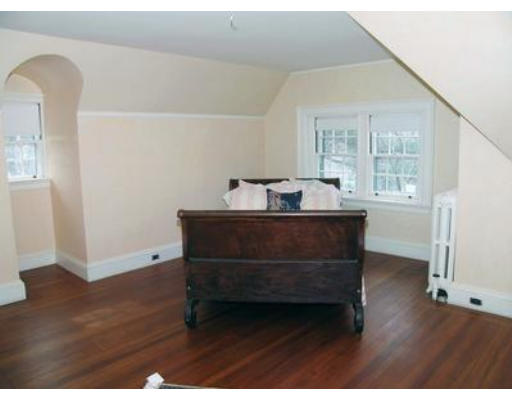46 Welch Road Brookline, MA 02445 - Photo 14 of 15 a living room with furniture and a wooden floor