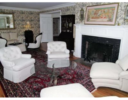 46 Welch Road Brookline, MA 02445 - Photo 6 of 15 a living room with furniture and a fireplace