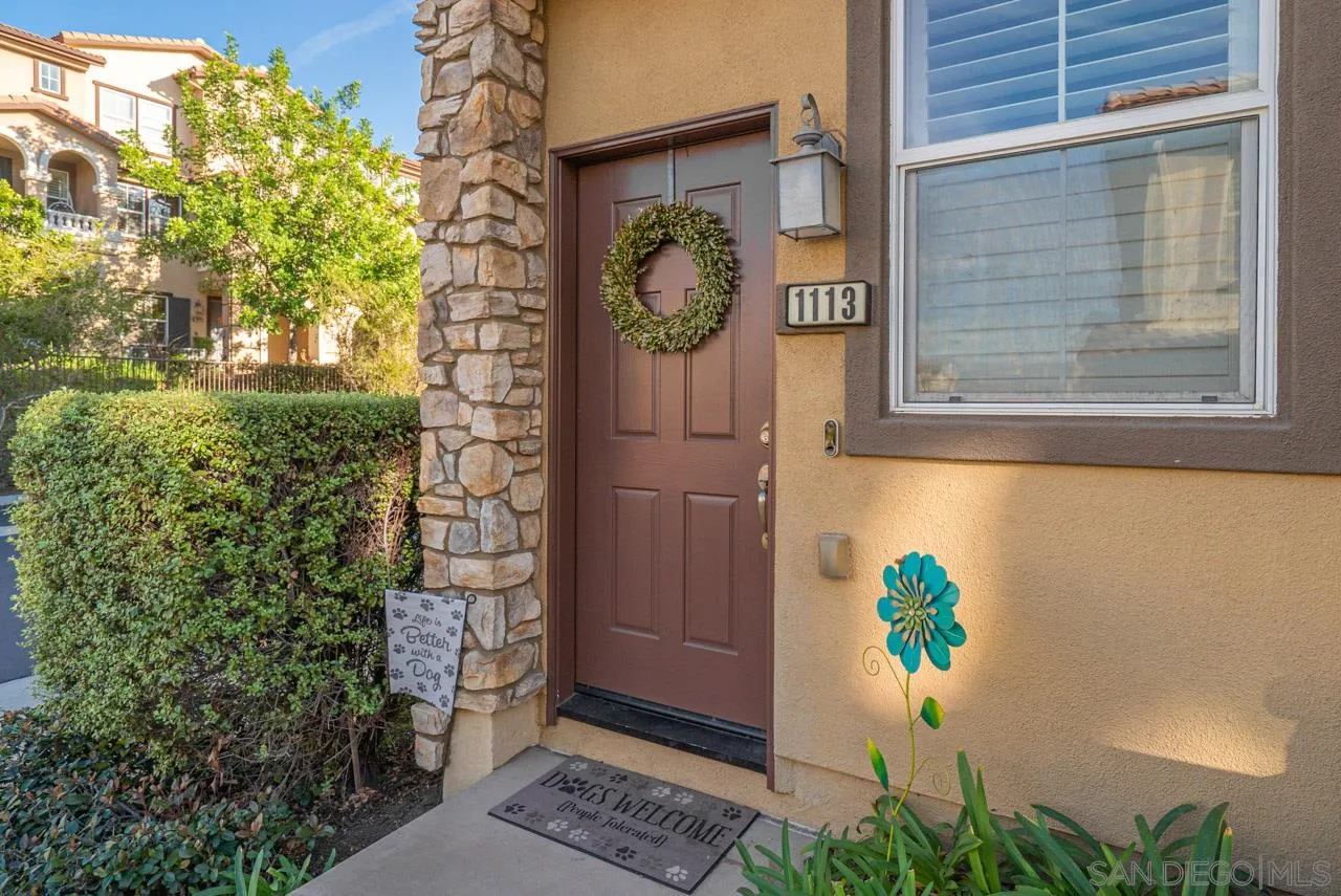 1113 Calabria Street Santee, CA 92071 - Photo 2 of 31 a front view of a house with garden