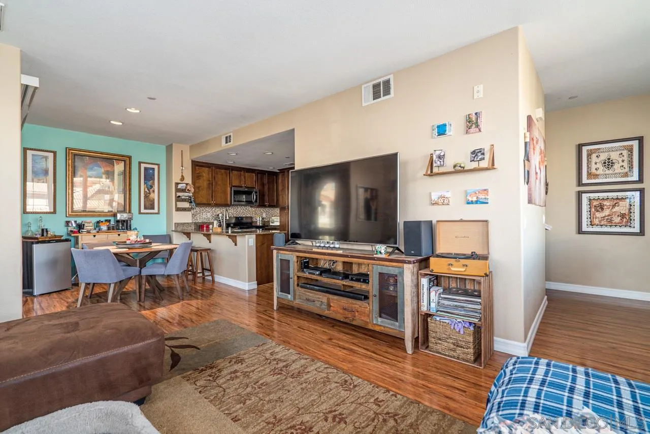 1113 Calabria Street Santee, CA 92071 - Photo 4 of 31 a living room with furniture and a flat screen tv