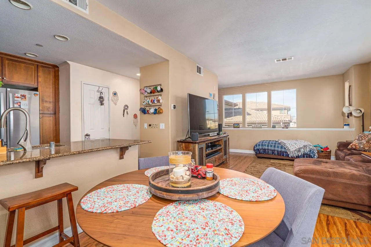 1113 Calabria Street Santee, CA 92071 - Photo 6 of 31 a living room with furniture and a table