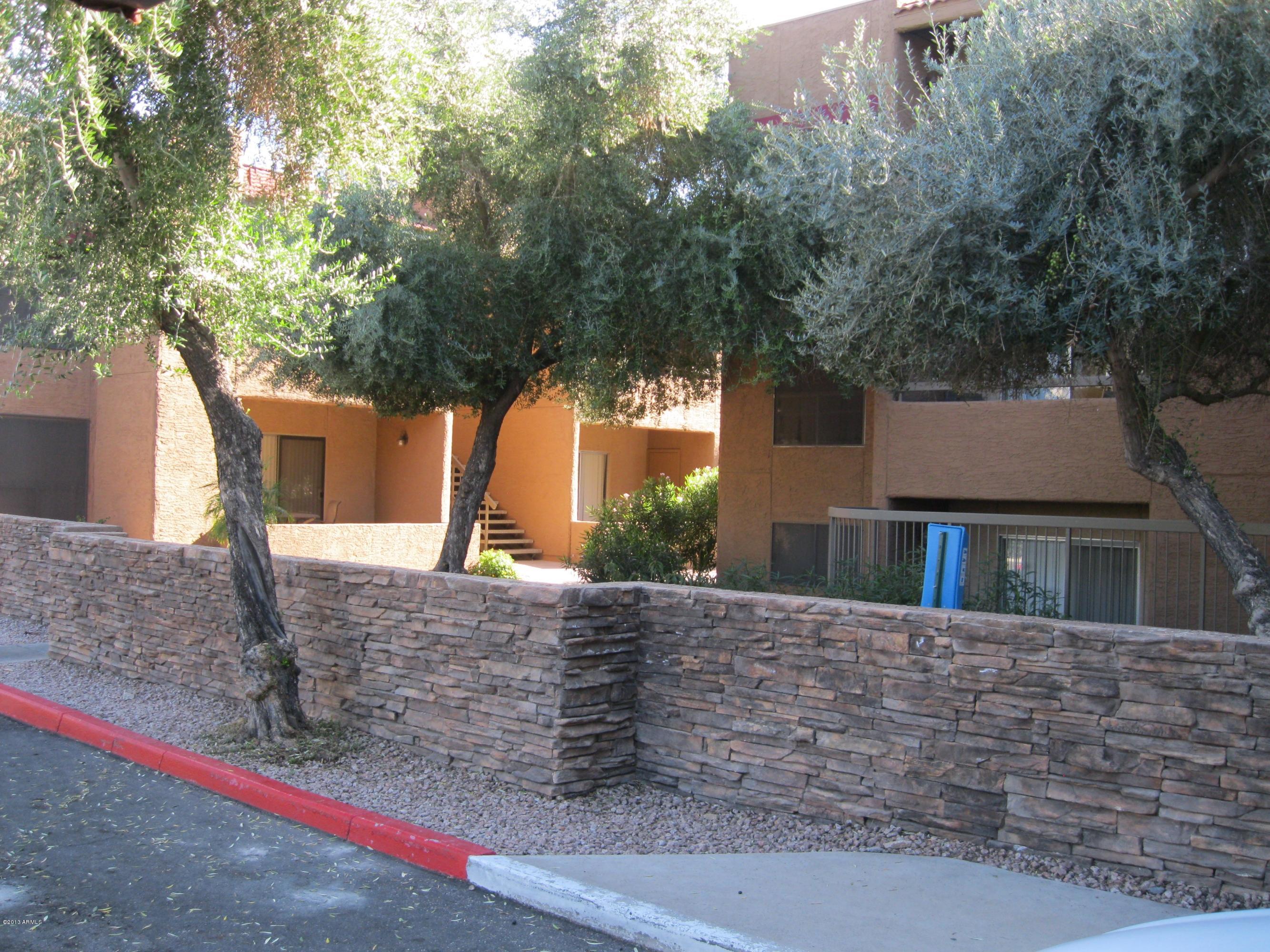 2625 East Indian School Road, Unit 229 Phoenix, AZ 85016 - Photo 11 of 11 a view of a house with a tree