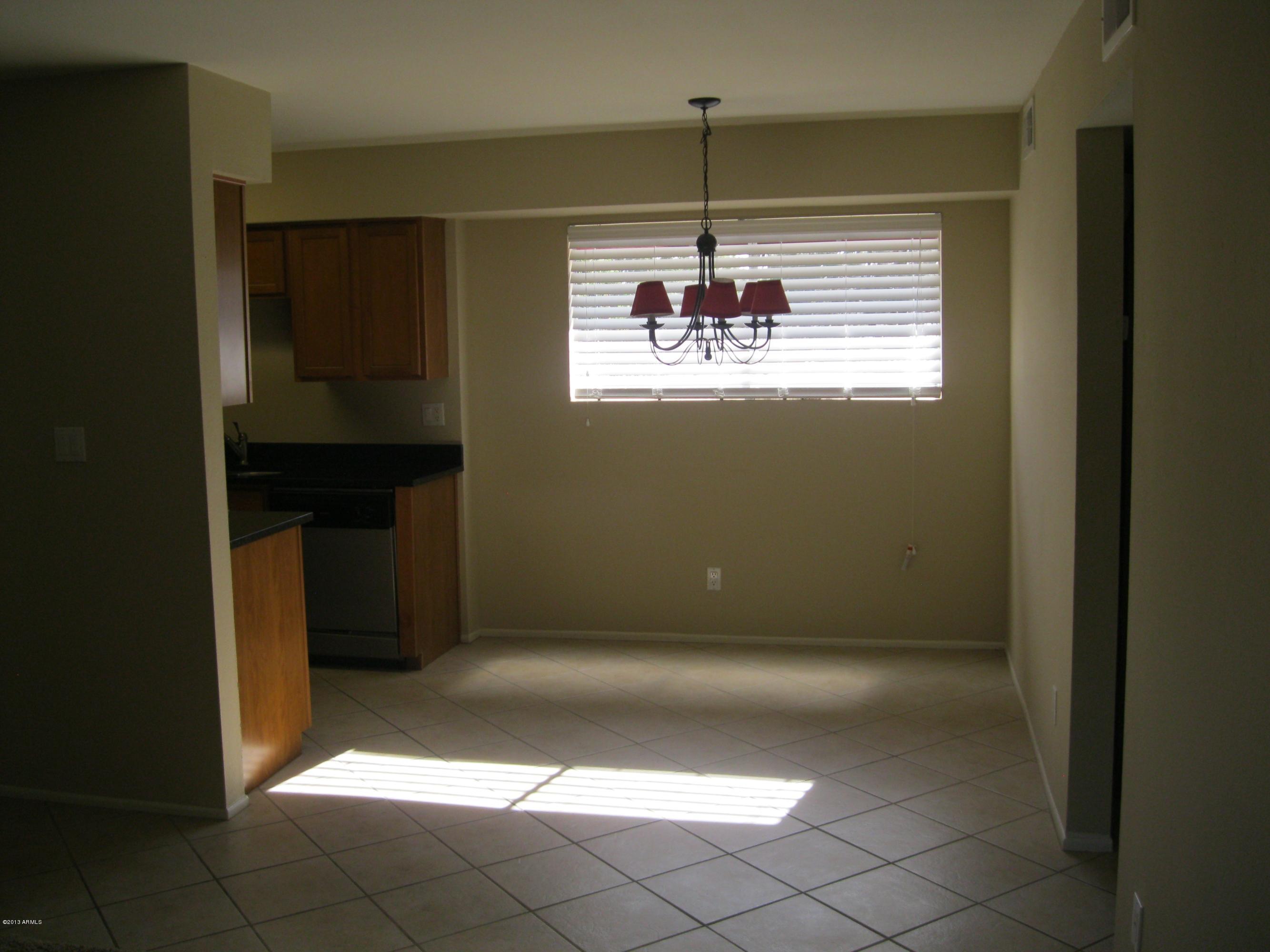 2625 East Indian School Road, Unit 229 Phoenix, AZ 85016 - Photo 3 of 11 a view of kitchen and window