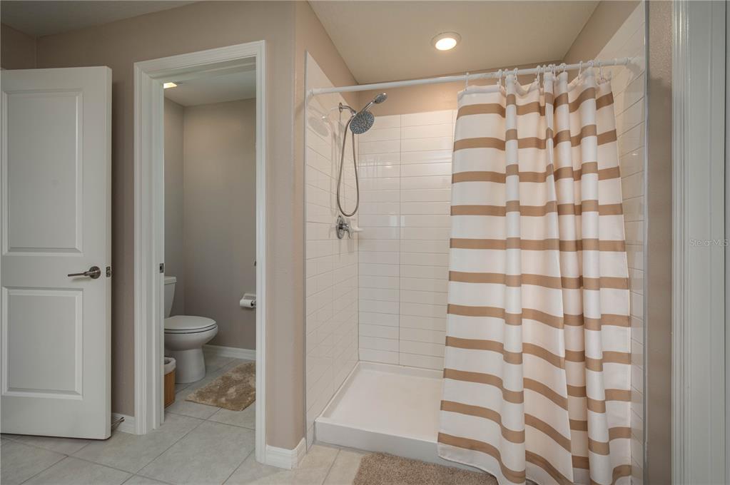 2958 Flying Blackbird Road Bartow, FL 33830 - Photo 16 of 28 a bathroom with a shower toilet and sink