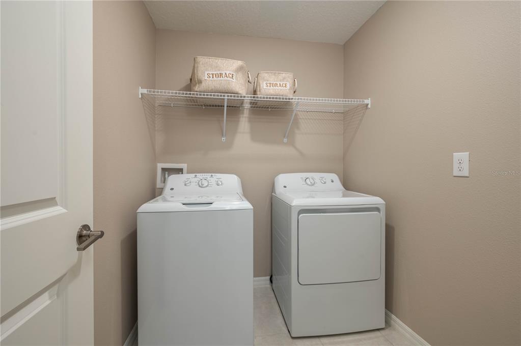 2958 Flying Blackbird Road Bartow, FL 33830 - Photo 23 of 28 a utility room with dryer and washer