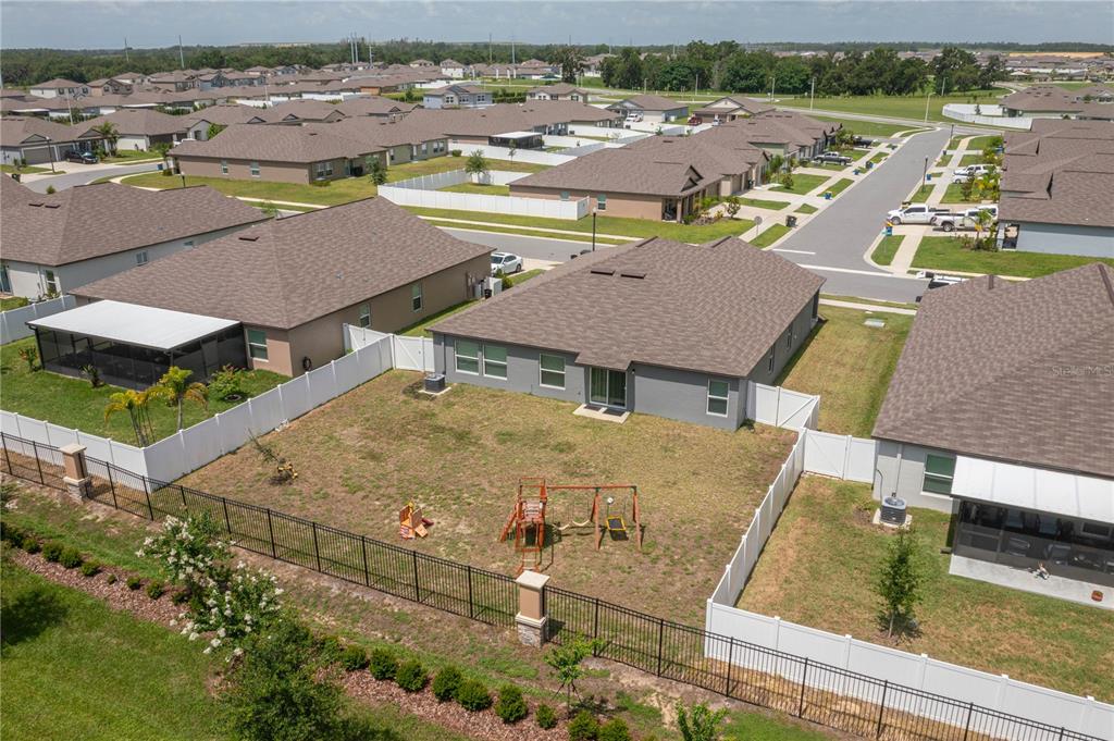 2958 Flying Blackbird Road Bartow, FL 33830 - Photo 24 of 28 an aerial view of residential houses with outdoor space