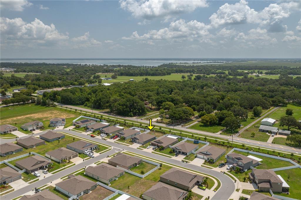 2958 Flying Blackbird Road Bartow, FL 33830 - Photo 25 of 28 an aerial view of residential houses with outdoor space