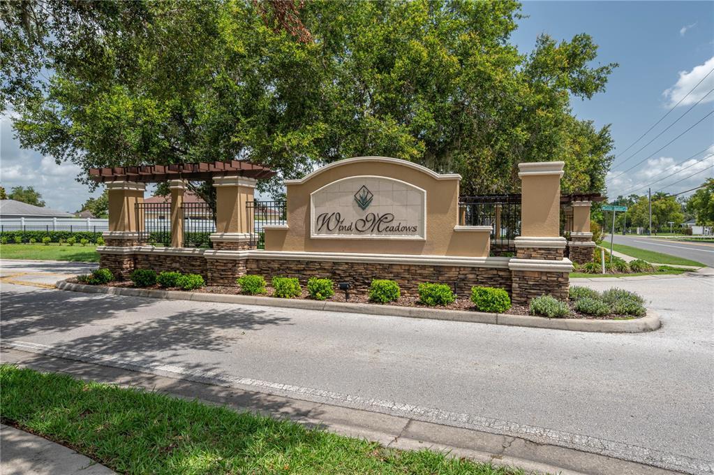 2958 Flying Blackbird Road Bartow, FL 33830 - Photo 28 of 28 a front view of a house with a garden and trees