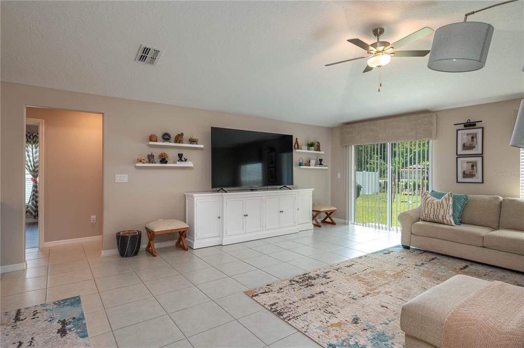 2958 Flying Blackbird Road Bartow, FL 33830 - Photo 4 of 28 a living room with furniture and a flat screen tv