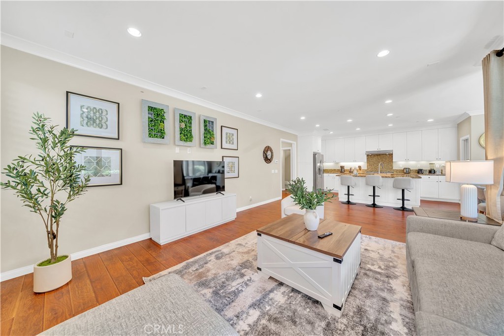 75 Gardenstone Path Irvine, CA 92620 - Photo 8 of 65 a living room with furniture and a potted plant