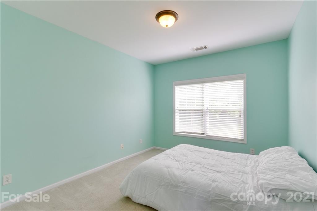 2007 Potomac Road Indian Trail, NC 28079 - Photo 12 of 29 a bedroom with a bed and a window
