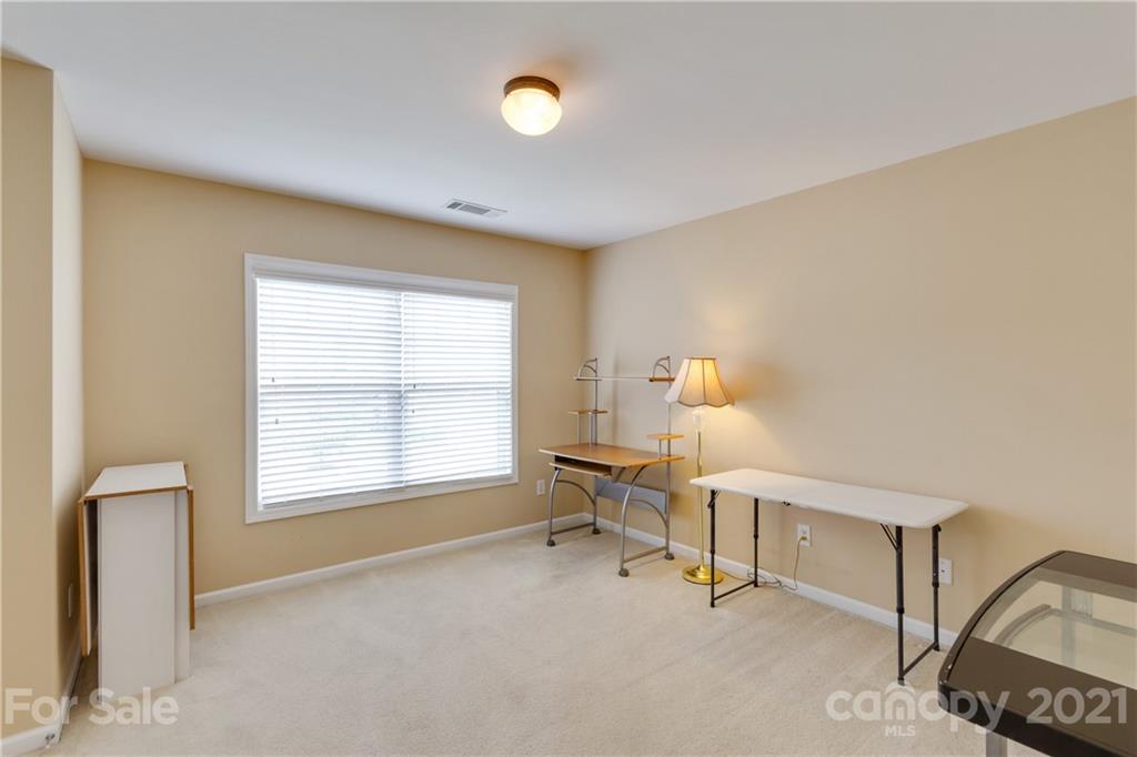 2007 Potomac Road Indian Trail, NC 28079 - Photo 19 of 29 a workspace with furniture and a window