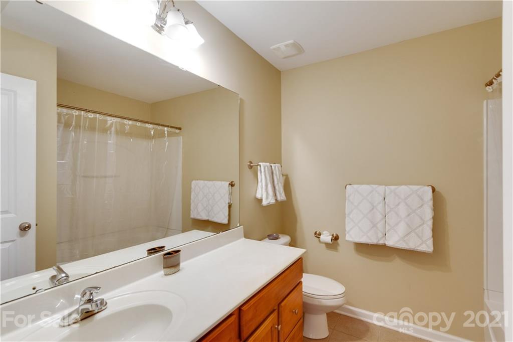 2007 Potomac Road Indian Trail, NC 28079 - Photo 20 of 29 a bathroom with a sink and a mirror