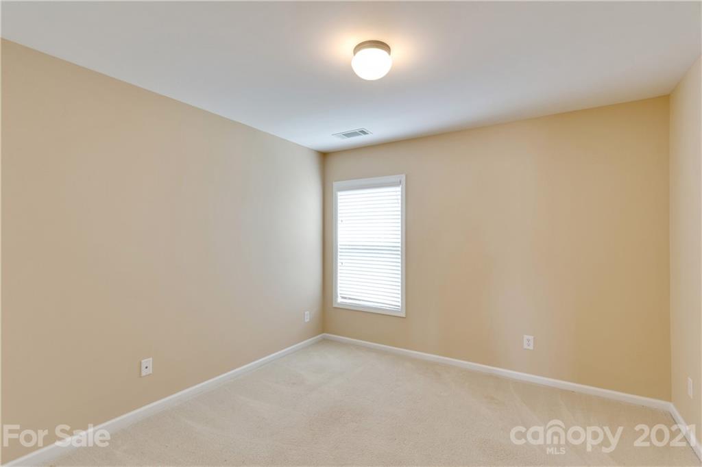 2007 Potomac Road Indian Trail, NC 28079 - Photo 22 of 29 an empty room with windows and closet