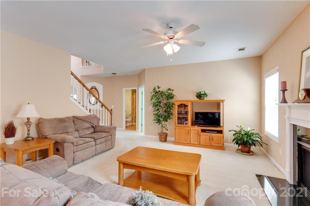 2007 Potomac Road Indian Trail, NC 28079 - Photo 7 of 29 a living room with furniture and a flat screen tv