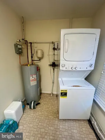 a view of a swimming pool and lounge chair