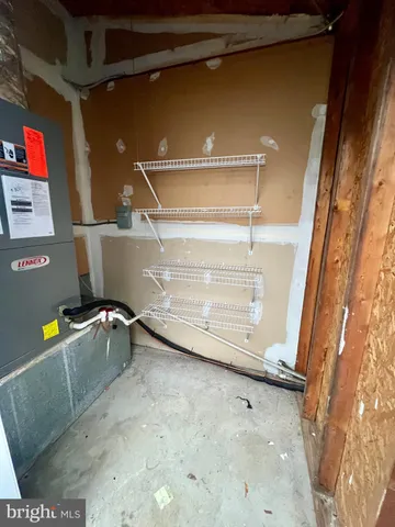 a front view of house with yard outdoor seating and barbeque oven