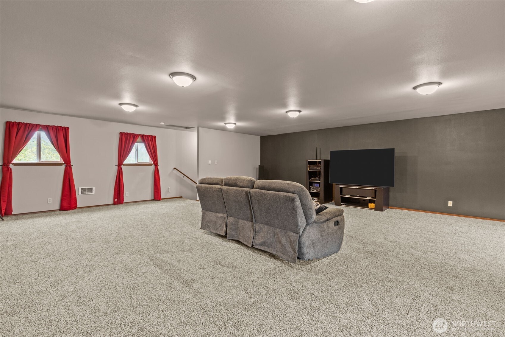 13314 Yeager Road Monroe, WA 98272 - Photo 23 of 40 a living room with furniture and a flat screen tv
