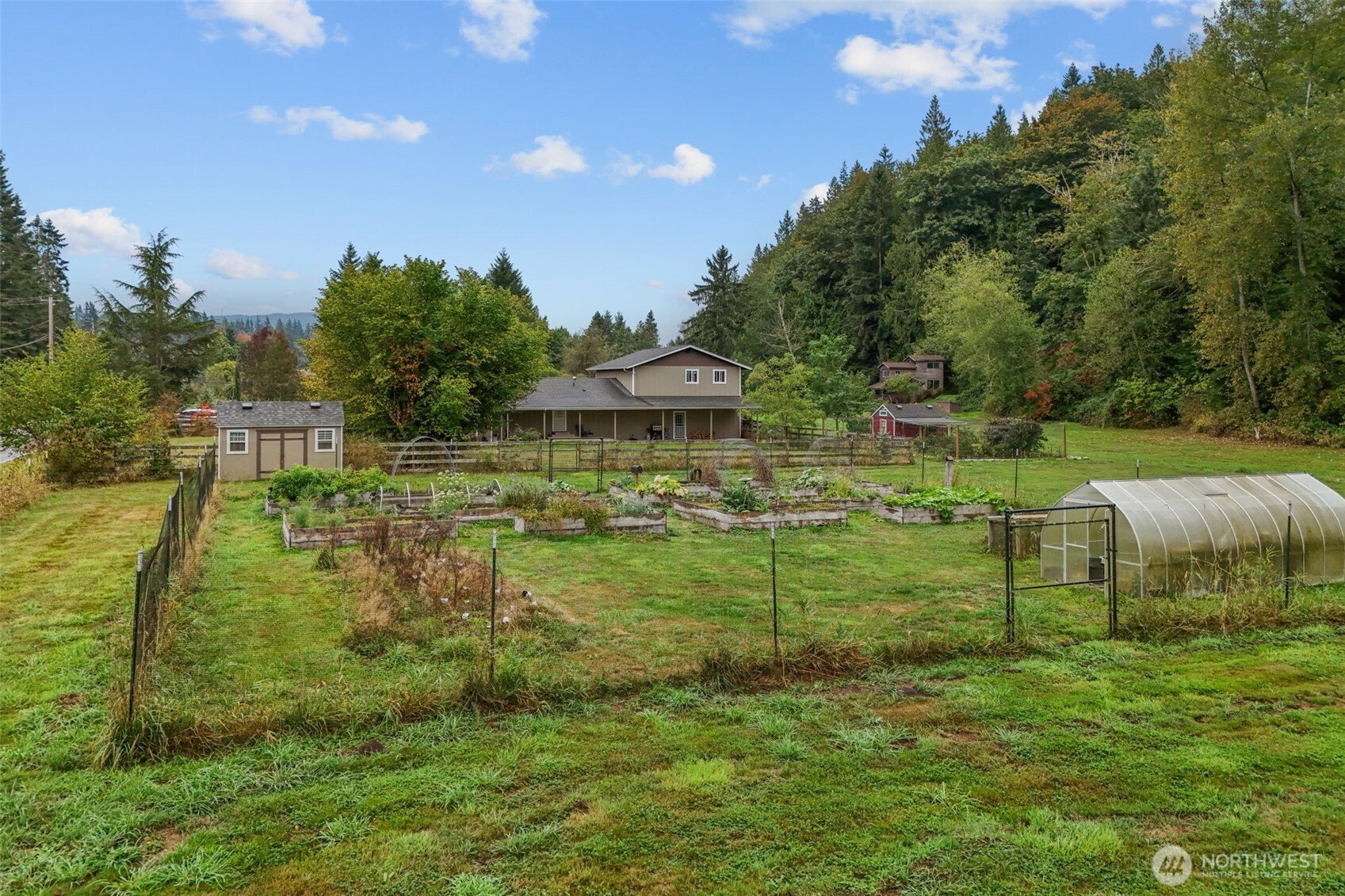 13314 Yeager Road Monroe, WA 98272 - Photo 35 of 40 a view of a garden with an outdoor space