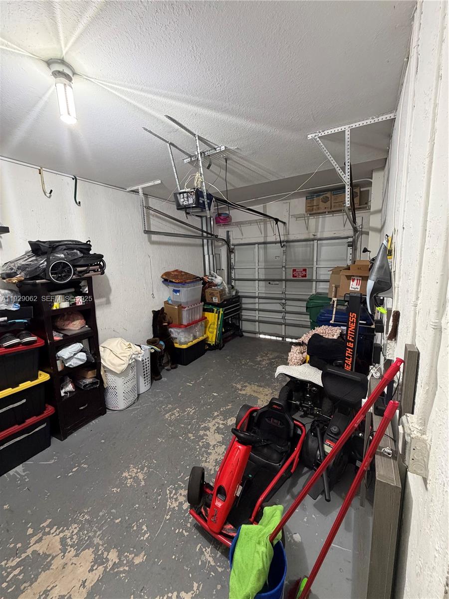 956 Southwest 148th Place Miami, FL 33194 - Photo 4 of 15 a view of storage and utility room