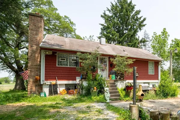 front view of house with a yard