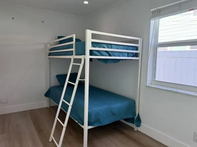 a room with walk in closet and a window