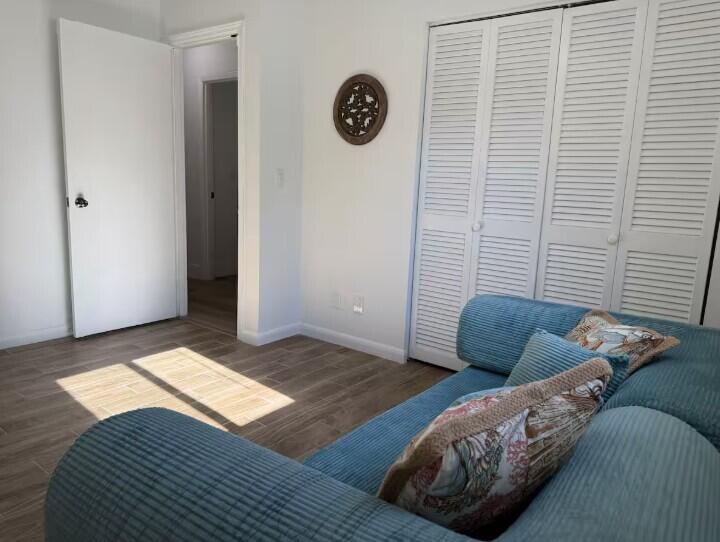 516 East Whitney Drive Jupiter, FL 33458 - Photo 26 of 47 a living room with furniture and a window
