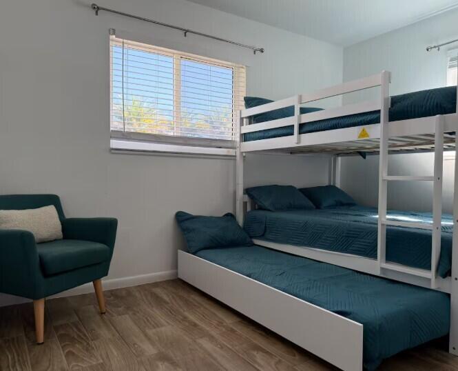 516 East Whitney Drive Jupiter, FL 33458 - Photo 28 of 47 a living room with furniture and a window