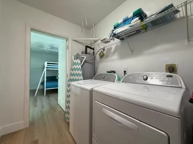 a utility room with dryer and washer