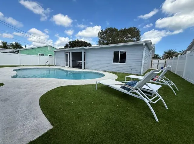a view of a backyard with a garden