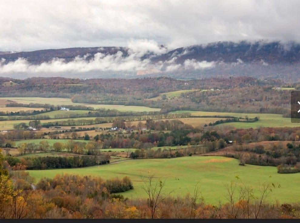 0 John Burch Road West, Unit A Dunlap, TN 37327 - Photo 22 of 29 1. Aerial pasture with clouds