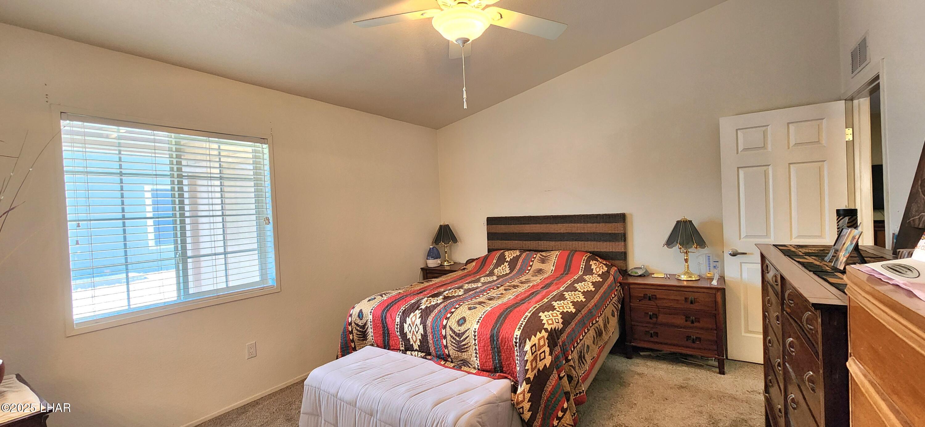 1545 East El Rodeo Road, Unit LOT 18 Fort Mohave, AZ 86426 - Photo 22 of 78 Primary Bedroom