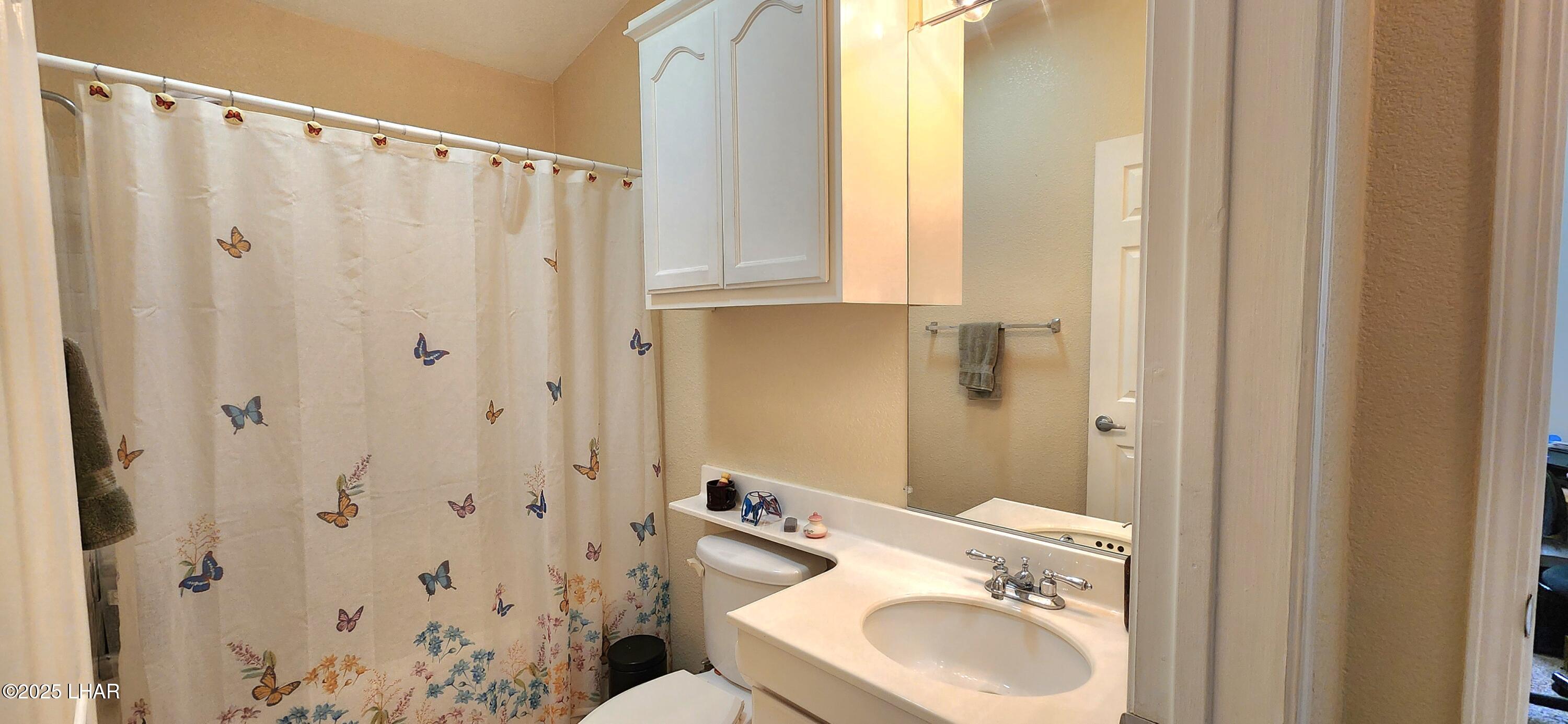 1545 East El Rodeo Road, Unit LOT 18 Fort Mohave, AZ 86426 - Photo 35 of 78 Guest bathroom