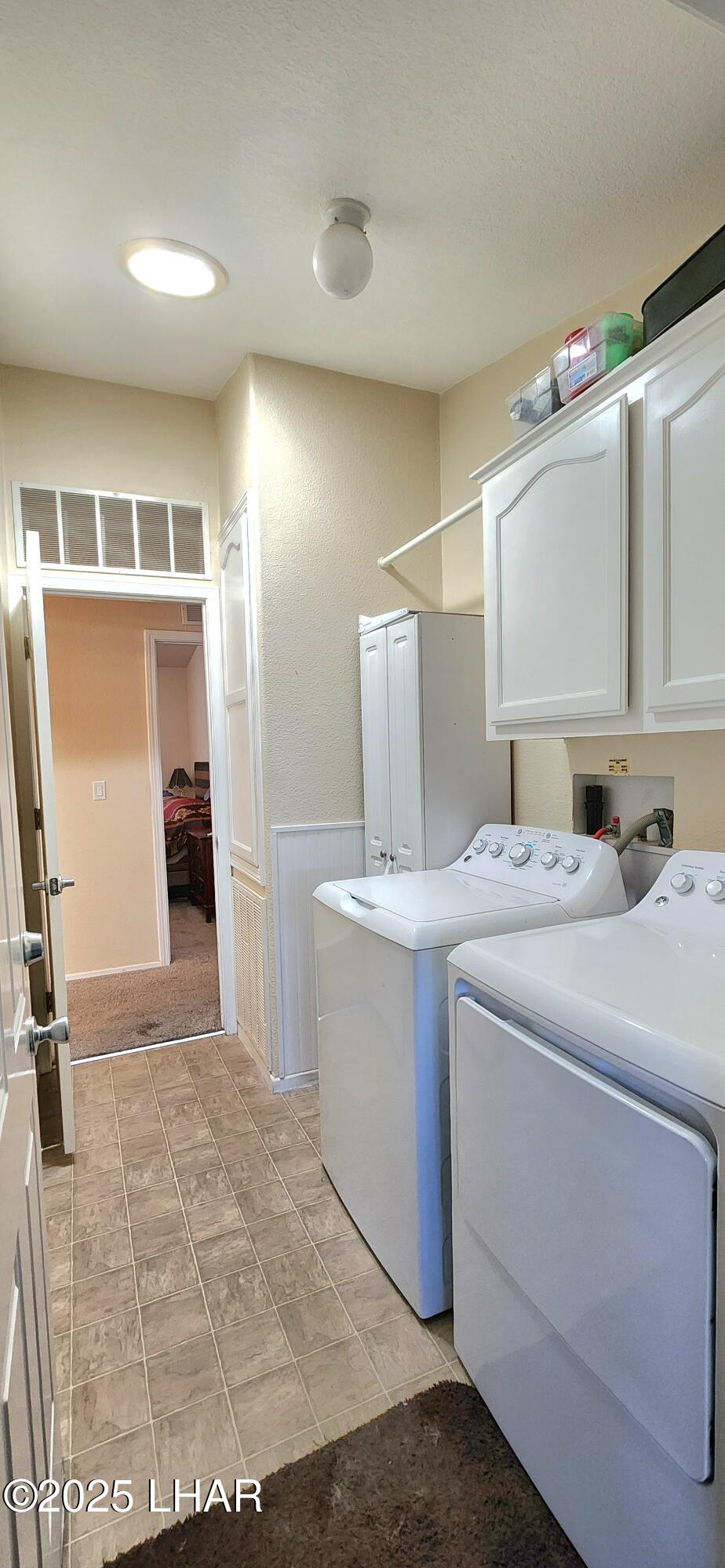 1545 East El Rodeo Road, Unit LOT 18 Fort Mohave, AZ 86426 - Photo 38 of 78 Utility room from garage door