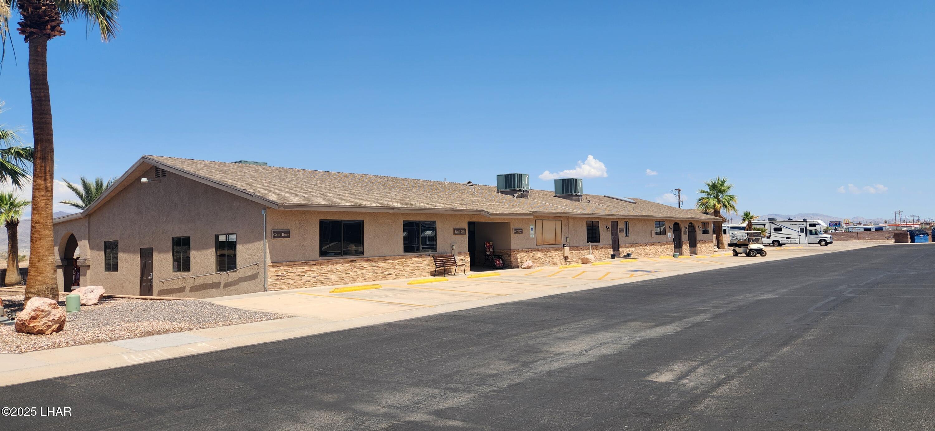 1545 East El Rodeo Road, Unit LOT 18 Fort Mohave, AZ 86426 - Photo 54 of 78 Community office, clubhouse, rec center, pool, spa, and so much more