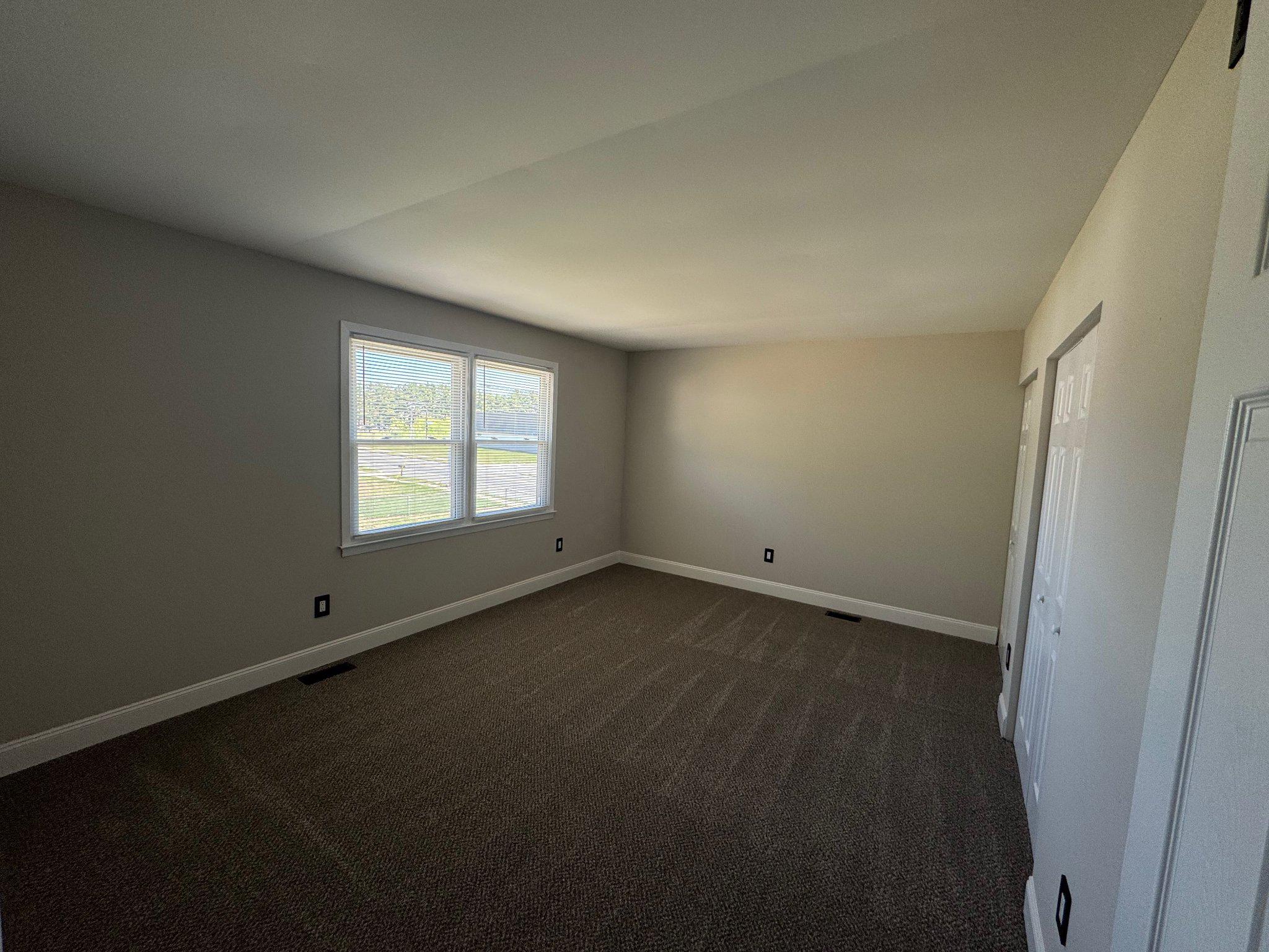 8 Framingham Road Beverly, NJ 08010 - Photo 26 of 35 an empty room with a window