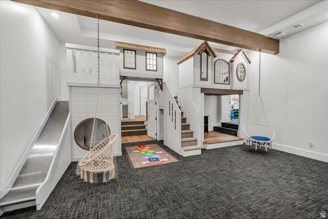 2608 Canyon Ridge Drive St. George, UT 84770 - Photo 75 of 86 Open playroomroom featuring a built-in play structure with stairs, slide, and miniature architectural elements