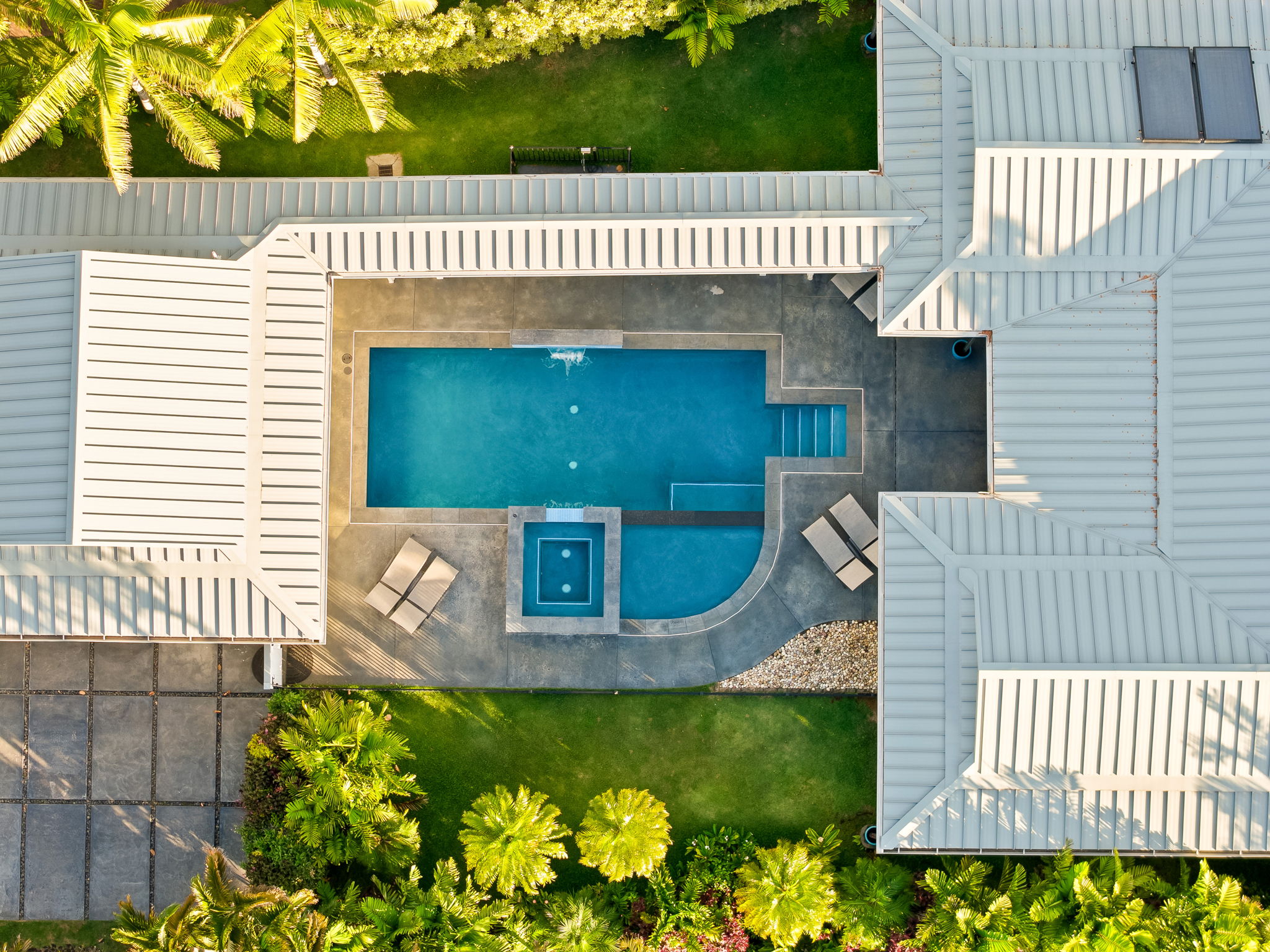 3868 Punahele Road Princeville, HI 96722 - Photo 23 of 24 a front view of a house with a garden