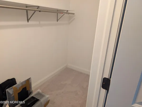 a view of small space with racks on the wall