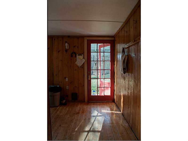 36-40 Hodgdon Road Tremont, ME 04674 - Photo 4 of 35 Mudroom. House front door into large...
