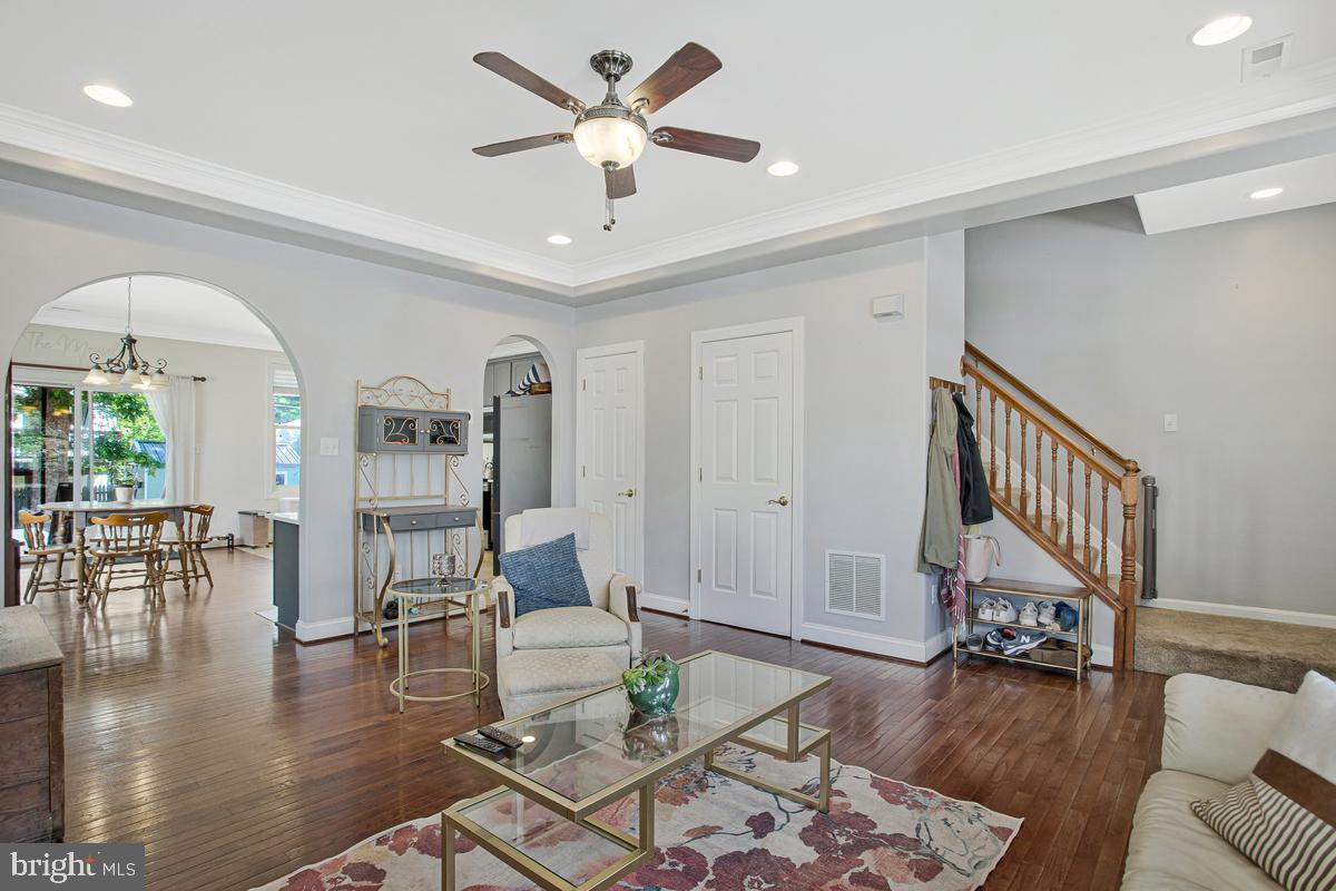 1617 Hilltop Road Edgewater, MD 21037 - Photo 18 of 36 a living room with furniture and a wooden floor
